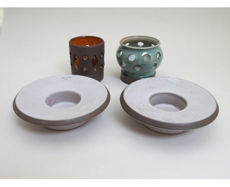 Four Swedish pottery tea-light holders 
