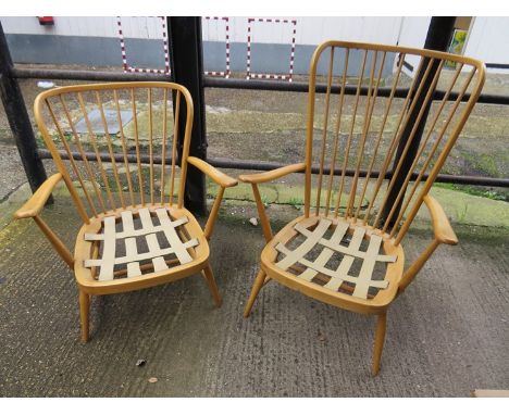 An Ercol light elm gentleman's high backed 'Windsor style' armchair and low backed lady's chair.