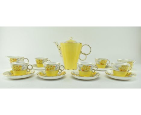 Osborne China - a vintage mid 20th century tea service, with yellow &amp; white ground decorated with flowers. The service co