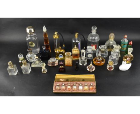 A collection of mid 20th century &amp; onwards French and continental glass perfume bottles, some with contents. The lot to i