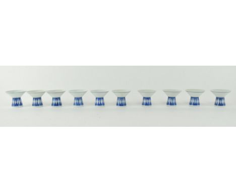 A collection of ten vintage 20th century blue and white porcelain sake cups, suited for use as tealight holders. Each of wide