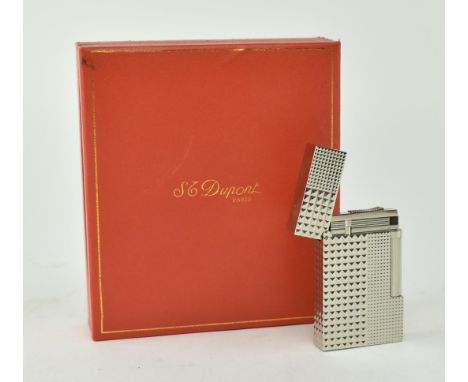 A vintage 20th century replica silver white metal cigarette lighter after S. C. Dupont, Paris. Presented in original leathere