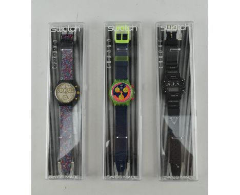 Swatch - Chrono Range - three vintage cased Swatch watches. The lot comprising Award SCB108 paisley patterned watch, an SCM b