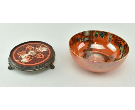 Wilkinson - a Victorian 19th century orange lustre bowl and a ceramic pan stand in silver plated mount and base. The lustre b