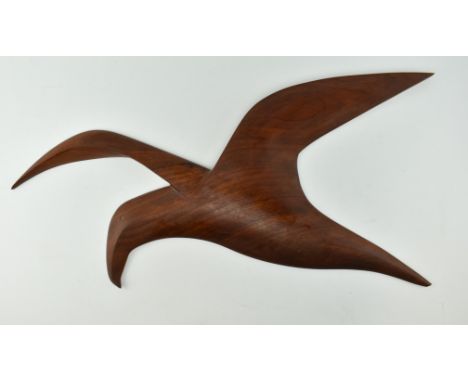 Richard Swale - a vintage late 20th century Cornish carved teak sculpture formed as a sea bird. Signed in pencil to verso Ric