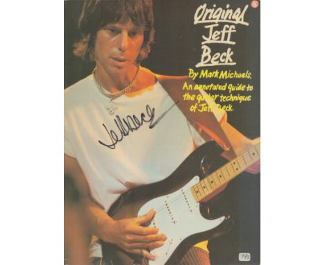 Jeff Beck signed paperback book an annotated guide to the guitar technique of Jeff Beck signature on front cover. Good condit