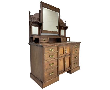 Edwardian mahogany dressing chest, raised triple mirror back with bevelled plates and fluted decoration over two trinket draw