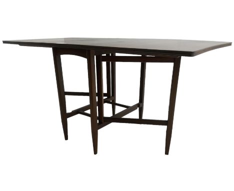 Mid-20th century teak dining table, moulded drop-leaf top on gate-leg action base, on tapering supports united by stretchers 