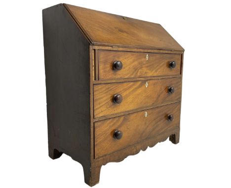 George III mahogany bureau, the fall front enclosing interior fitted with pigeon holes, drawers and cupboard, three graduatin