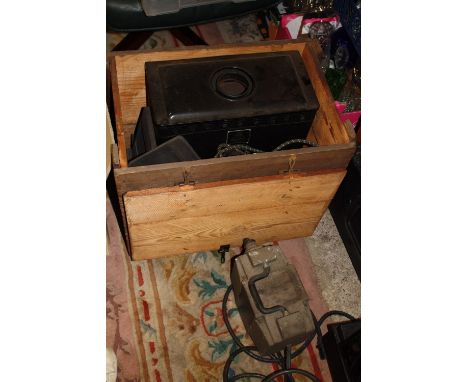 A LARGE BOXED VINTAGE PROJECTOR