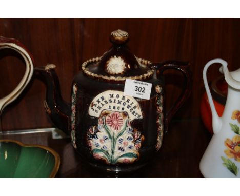 A BARGEWARE TEAPOT DATED 1886