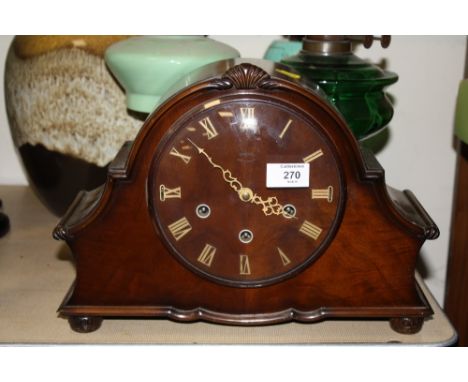 A VINTAGE SMITHS  MANTEL CLOCK CHIMING ON BARS 