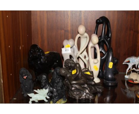A COLLECTION OF MODERN FIGURES TO INCLUDE HEREDITIES COLLECTION FIGURE OF A COUPLE ROMANCING, SPANIEL FIGURES, JADE TYPE DRAG