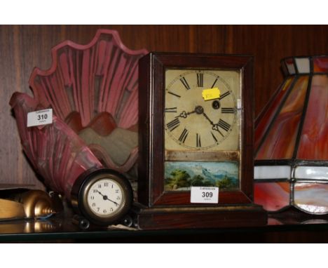 AN EBONISED DESK CLOCK PLUS A RECTANGULAR OAK FRAMED MANTEL CLOCK (2)  