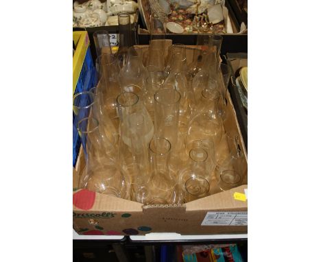 A TRAY OF VINTAGE OIL LAMP FLUES 