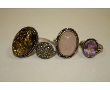 FOUR VINTAGE SILVER DRESS RINGS