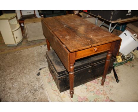 A VINTAGE PEMBROKE TABLE