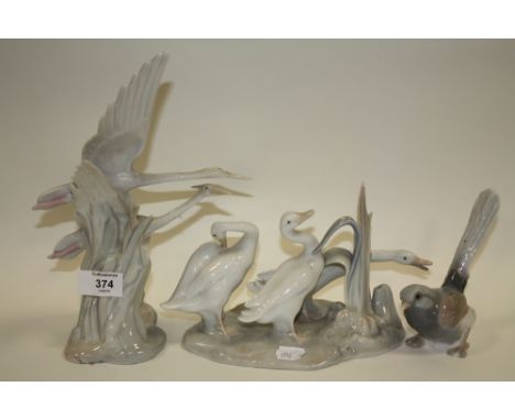 A NAO FIGURE GROUP OF BIRDS IN FLIGHT TOGETHER WITH ANOTHER LLADRO EXAMPLE AND A LLADRO BIRD (3)