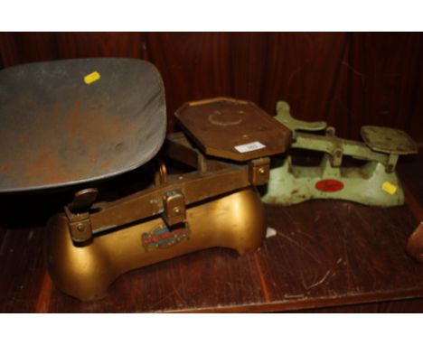 A VINTAGE SET OF SCALES BY W.E POLLARD AND SONS, TOGETHER WITH A SMALLER EXAMPLE (2)  