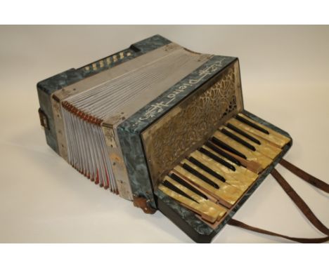 A VINTAGE BANJO A/F TOGETHER WITH AN UNUSUAL CARVED EXAMPLE AND A CASED VINTAGE GERMAN PIETRO ACCORDION A/F (3)