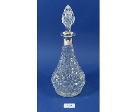 A cut glass decanter with silver collar, London 1924 