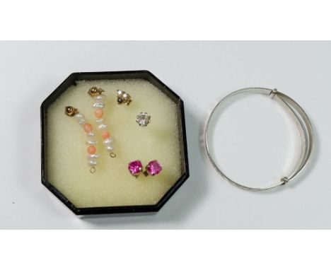 A pair of freshwater pearl and coral earrings a pair of pink stone earrings and a white metal 'Twinkle Twinkle' christening b