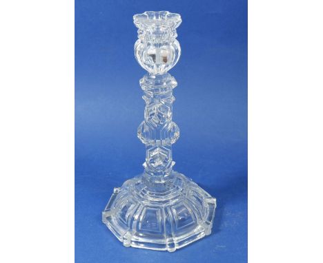 A moulded glass candlestick marked Baccarat 25cm tall 