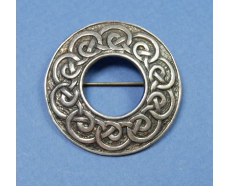 A Celtic Iona silver circular brooch designed by Alexander Richie and made by John Hart, 4cm diameter