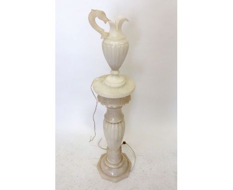 An alabaster torchere stand with ewer form illuminated alabaster lantern, 107cm tall 