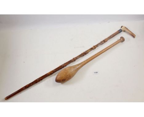 A horn handled walking stick and a Victorian turned wood juggling club 