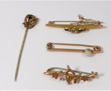 A gold bar brooch set opal (unmarked) 2.2g, two Edwardian 9ct gold bar brooches and a stick pin, 4g 