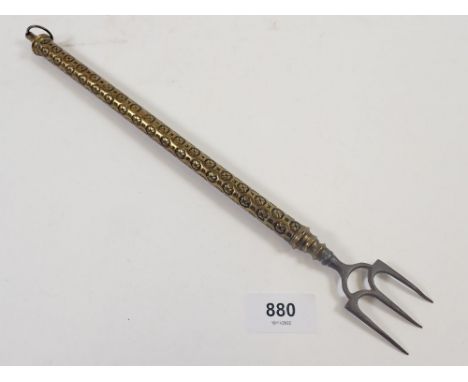 A Victorian brass extending toasting fork 