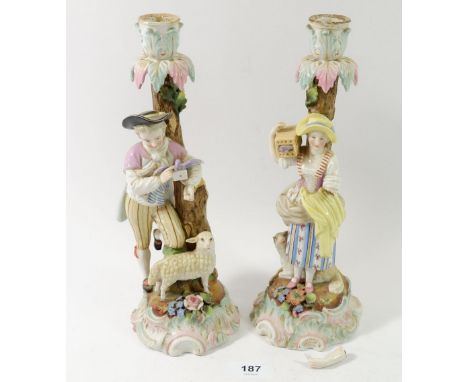 A pair of Meissen style candlestick figures of Galant and Companion a/f with faux A R marks, 26cm H 