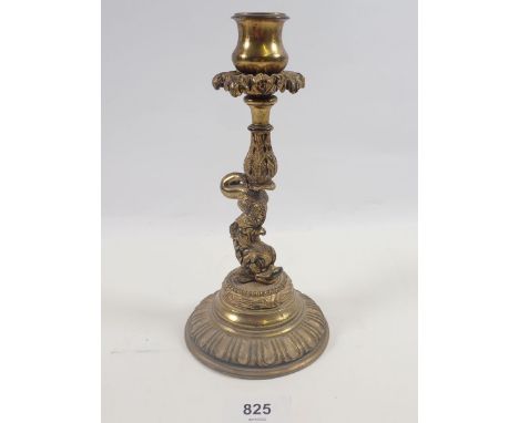 A 19th century cast brass dolphin candlestick, 22cm tall