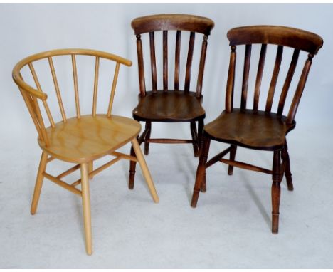 Two elm seated farmhouse chairs and a light wood stick back kitchen chair 