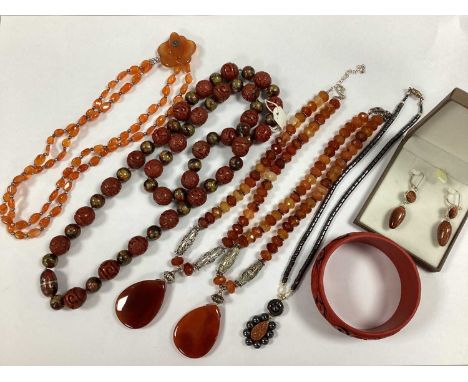 A Small Collection of Hardstone Jewellery, including a multi-strand necklace, to flowerhead design T-bar clasp, traditional s