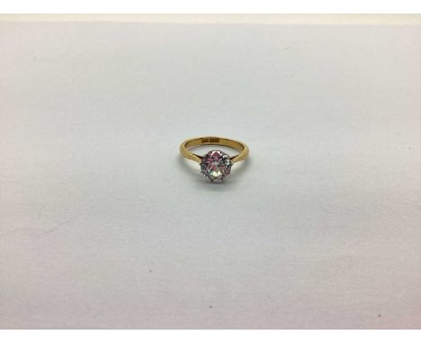 A Zircon Single Stone Dress Ring, claw set, stamped "18ct Plat" (finger size P) (3.3grams).