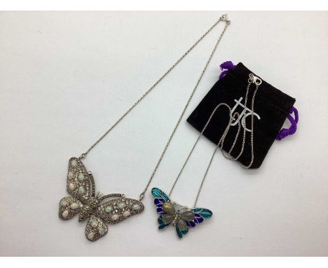A Large Ornate Butterfly Pendant, allover inset, with cabochon claw set highlights, to integral snake style chain, stamped "9
