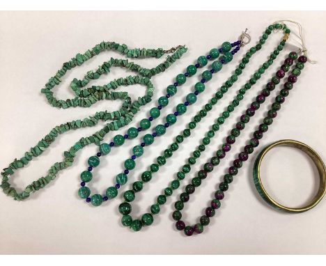 A Small Collection of Modern Polished Hardstone Necklaces, in hues of green, two of uniform design, with a graduated bead nec
