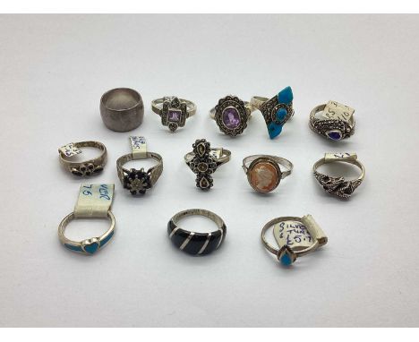 A Hallmarked Silver Minimalist Band Ring, together with a collection of "925" and other rings, including stone set floral clu