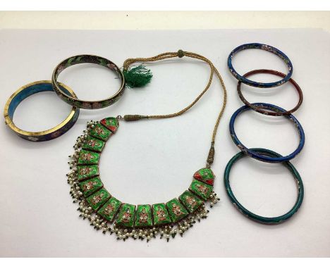 An Indian Inspired Enamel Neckace, each decorative panel inset, supending bead fringe, to cord and tassle, together with a se