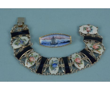 An enamelled Norwegian silver panel bracelet decorated with flowers, stamped 830S and made by Ivar T Holth c1940s/50s plus a 