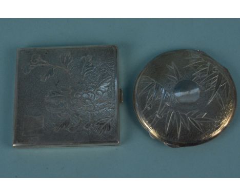 A sterling silver compact, square shape with floral decoration, stamped Sterling Silver Made in Hong Kong, together with a wh