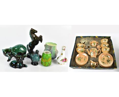 A small Poole green glazed vase, height 9.5cm, a Royal Albert Old Country Roses vase (second), four green glazed animals and 