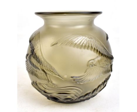 A contemporary bulbous glass vase with Art Deco style decoration depicting birds in flight, on a smoky grey ground, unsigned,