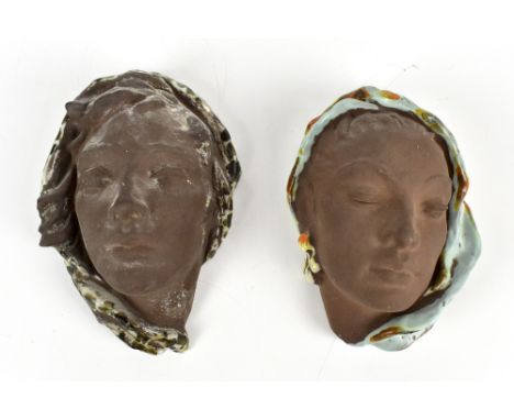 KARLSRUHE; two Art Deco portrait wall masks, one example with turquoise glazed shawl, height 18cm (2).Additional InformationG
