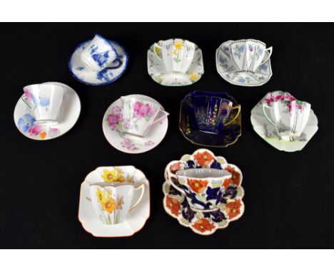 WILEMAN &amp; CO; a Foley teacup and saucer decorated in the Imari palette, together with eight further Wileman &amp; Co and 