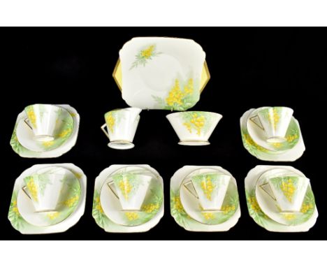 SHELLEY; a twenty-one piece tea service in the Eve shape, decorated in the 'Laburnum' pattern, pattern no.12420.Additional In