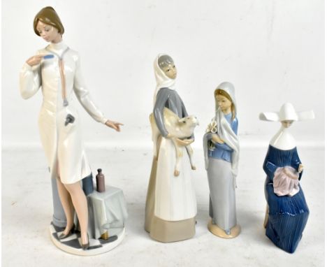LLADRO; four figures comprising a female doctor, woman holding lamb, woman holding flowers and seated nun, height of doctor 3