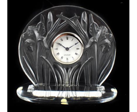 LALIQUE FRANCE; a clear and frosted glass ‘Iris’ mantel clock, signed to rim, height 17cm.Additional InformationLight scratch